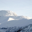 Und die Bergspitzen sahen nicht rauh, sondern weich und freundlich aus, als ob jemand Puderzucker darÃ¼ber gestreut hÃ¤tte.